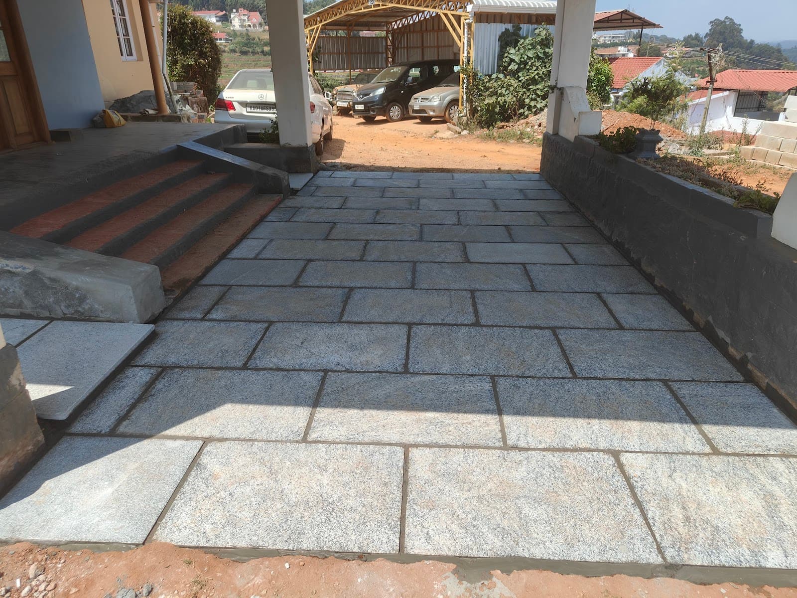 Monolithic Granite Portico & Driveway Paving